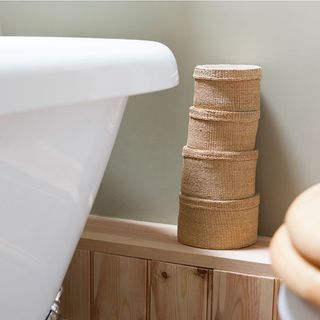 bathroom with woven storage baskets