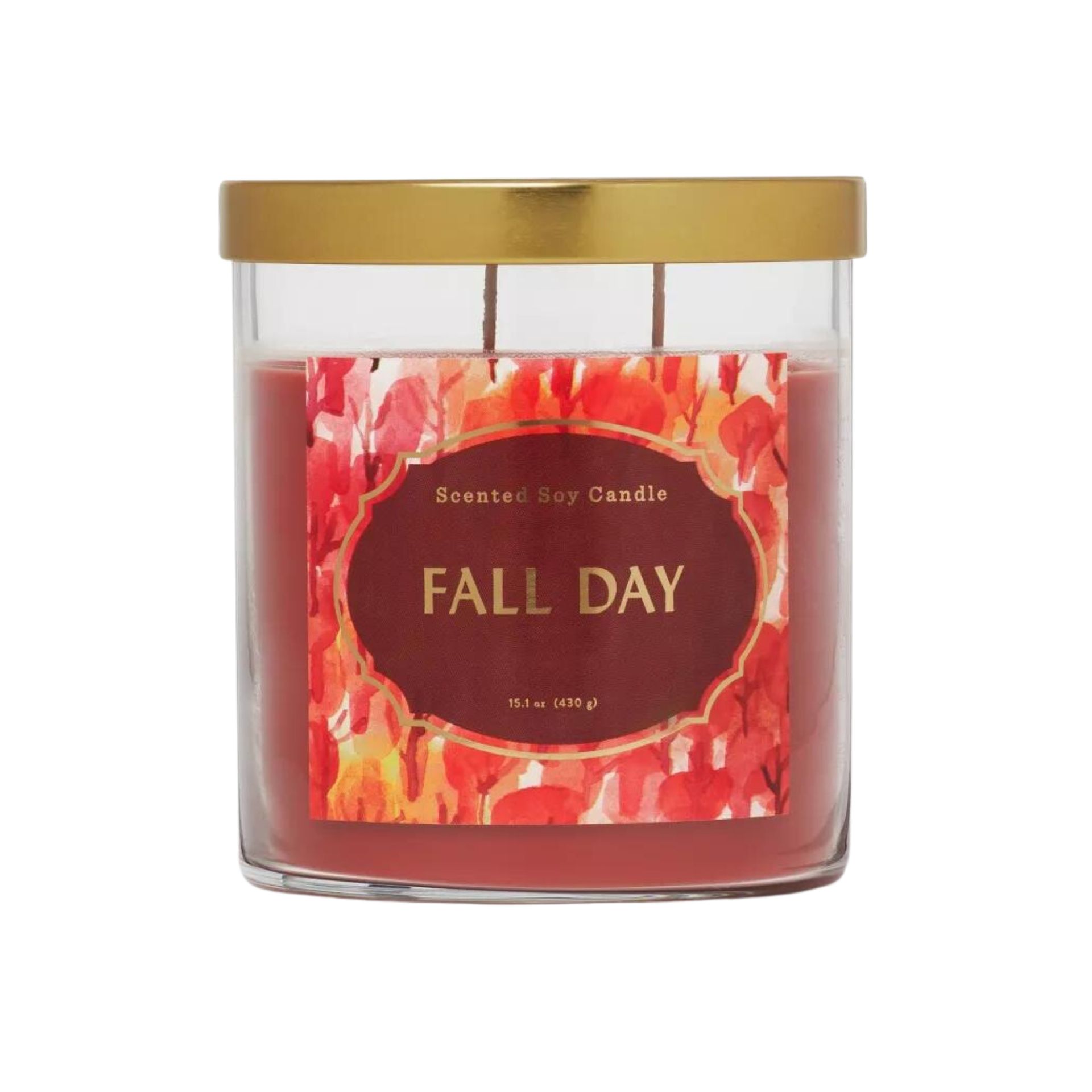 Lilin merah dalam toples kaca dengan penutup