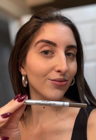 Marisa holding the L’Oréal Paris Micro Ink Pen by Brow Stylist