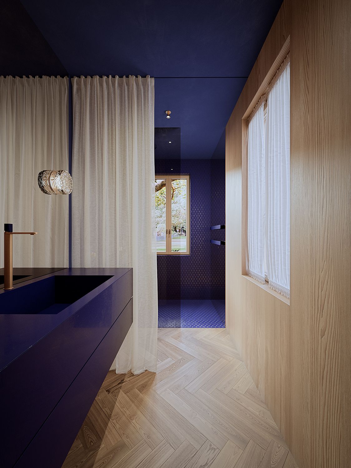 modern bathroom with wooden floor and blue walls
