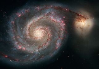 The majestic spiral galaxy M51, the Whirlpool galaxy, looks great in May