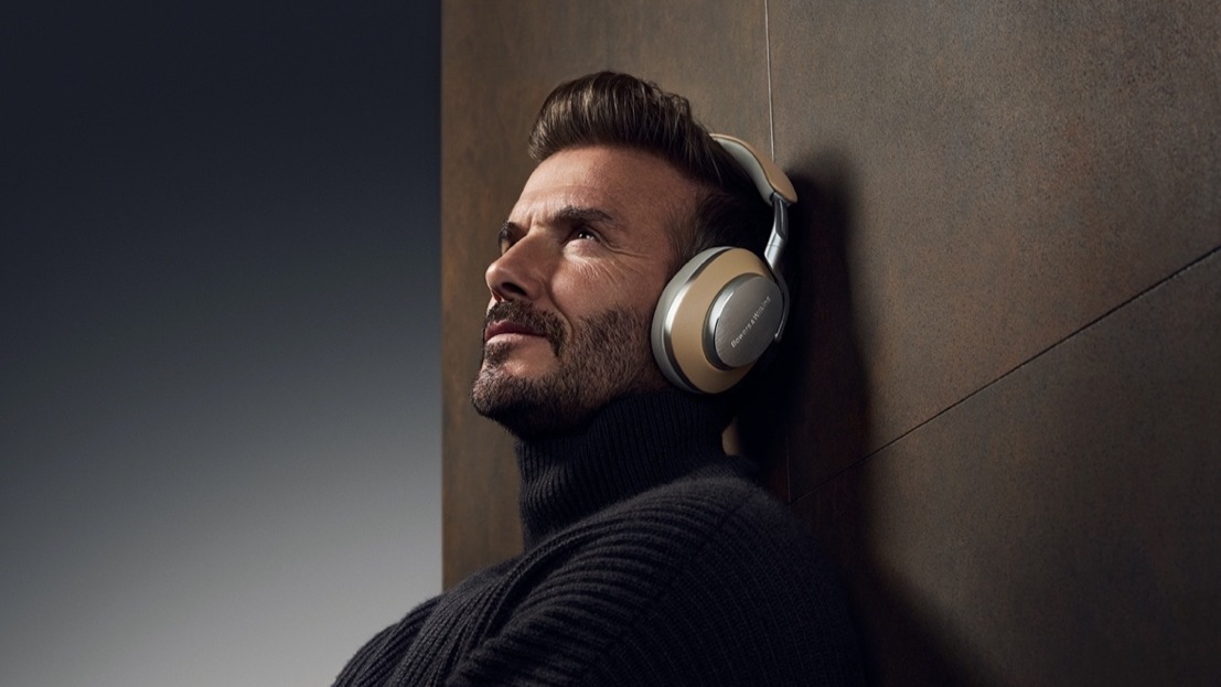 David Beckham wearing a pair of Bowers &amp;amp; Wilkins wireless headphones
