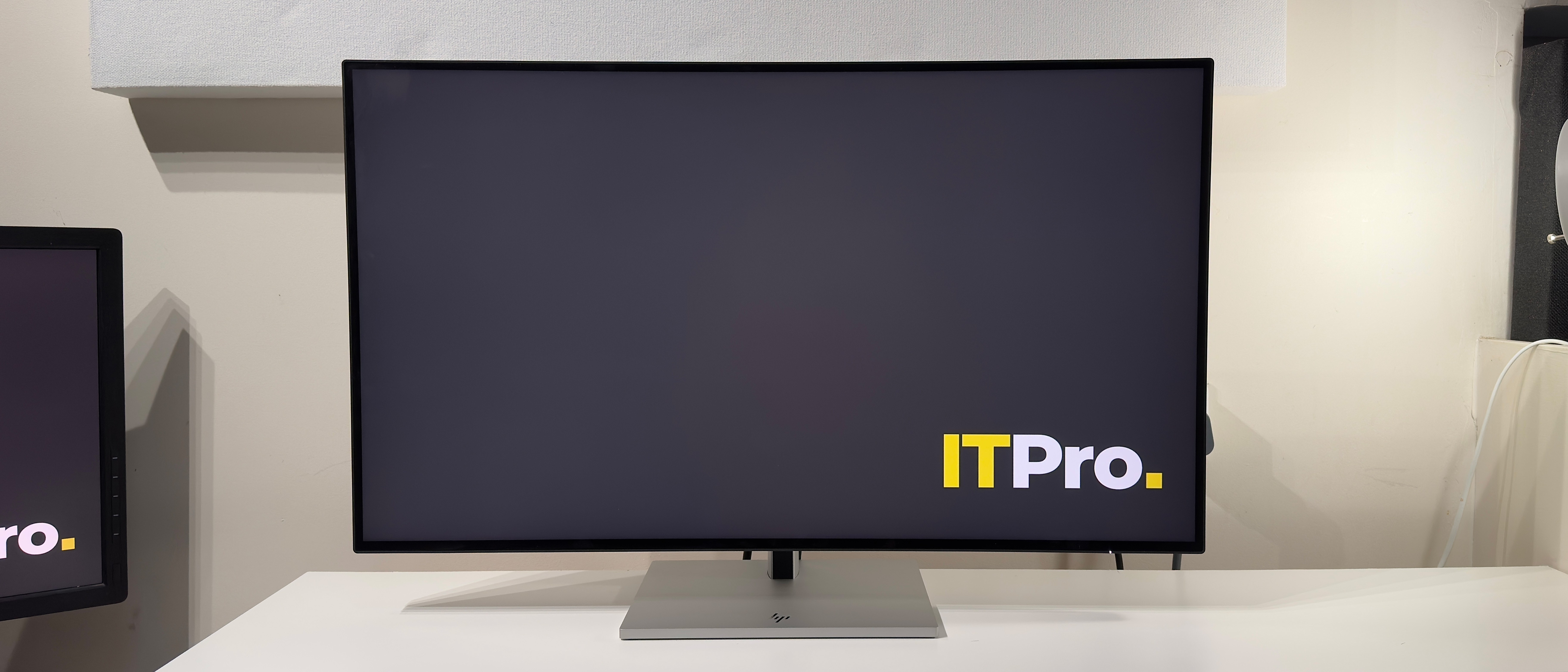 The HP Series 7 Pro 732xk monitor on a desk
