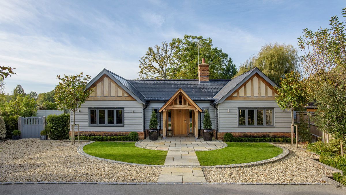 dormer bungalow with gravel driveway