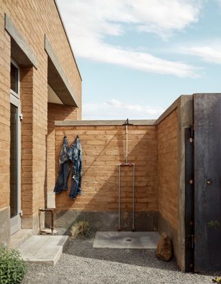 Outdoors shower at house in Marfa