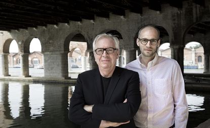 David Chipperfield and Simon Kretz photographed together in front of a river