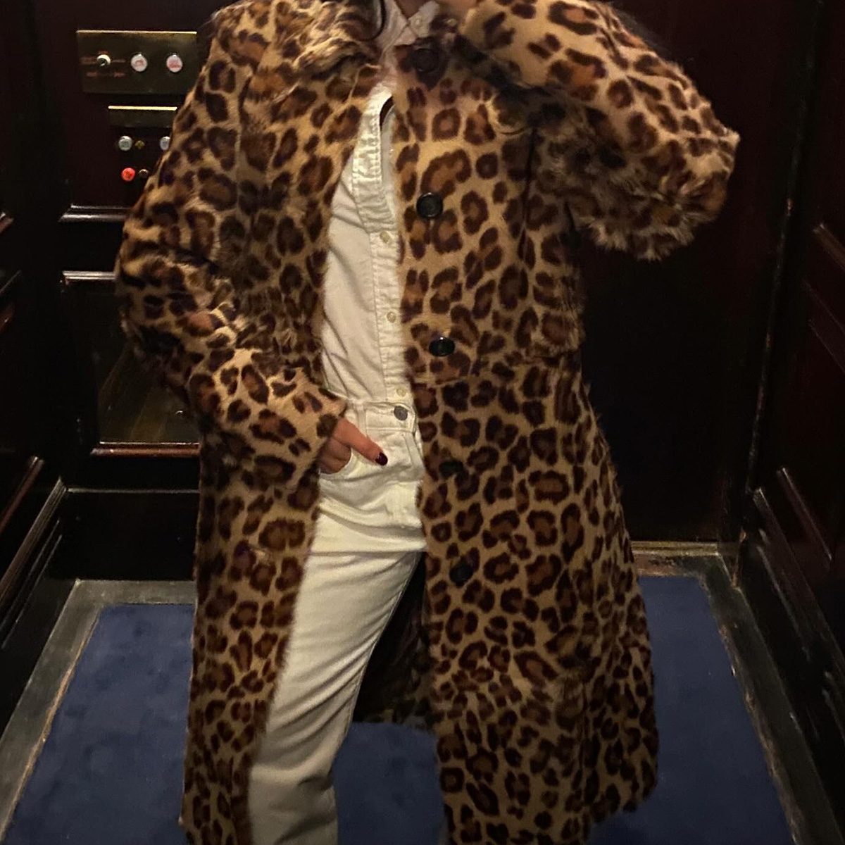 Julia Rabinowitz wearing a white-jeans outfit with a leopard-print Ralph Lauren coat in 2026.