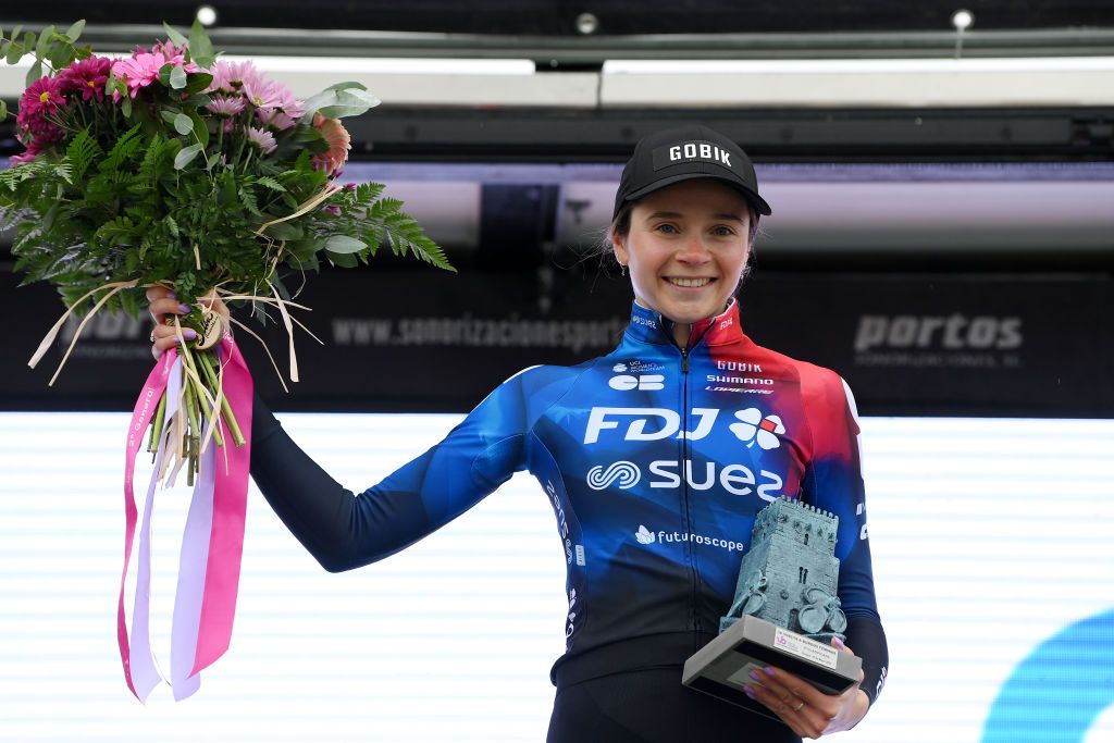 CANICOSA DE LA SIERRA SPAIN MAY 19 Evita Muzic of France and FDJ SUEZ Team on second place poses on the podium ceremony after the 9th Vuelta a Burgos Feminas 2024 Stage 4 a 122km stage from Pearanda de Duero to Canicosa de la Sierra 1144m UCIWWT on May 19 2024 in Canicosa de la Sierra Spain Photo by Alex BroadwayGetty Images