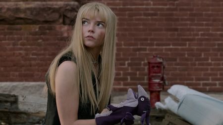 Anya Taylor-Joy with a puppet at the end of The New Mutants