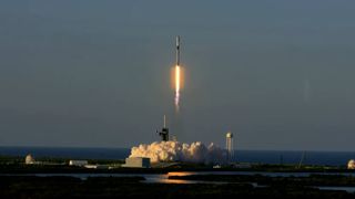 A SpaceX Falcon 9 rocket launches 49 Starlink satellites from Pad 39A at NASA's Kennedy Space Center in Florida.