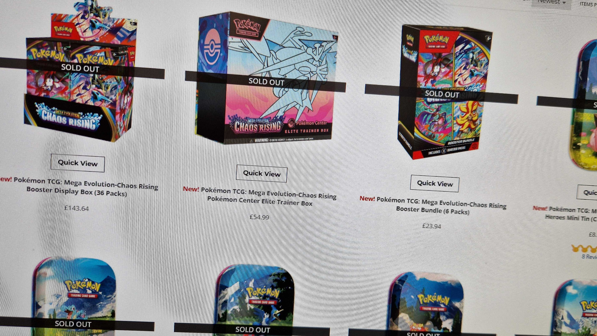 A selection of Pokemon card listings with 'sold out' over the top