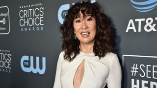 Sandra Oh with urly shag with bangs