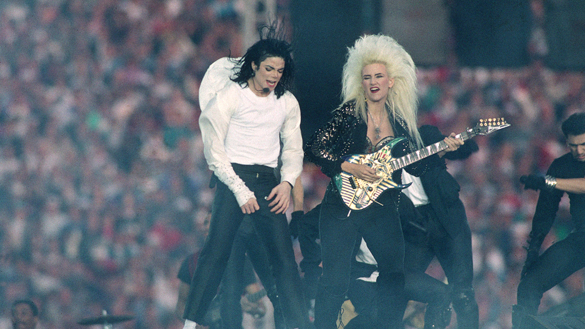 Michael Jackson and Jennifer Batten perform live on stage in Jerudong Park on 16th July 1996 in Brunei