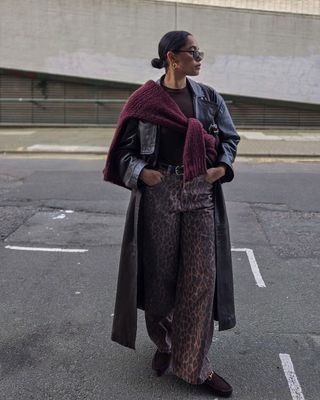 Lauren in black leather coat and burgundy jumper