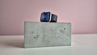 Apple Solo Loop on block with watch displaying weather