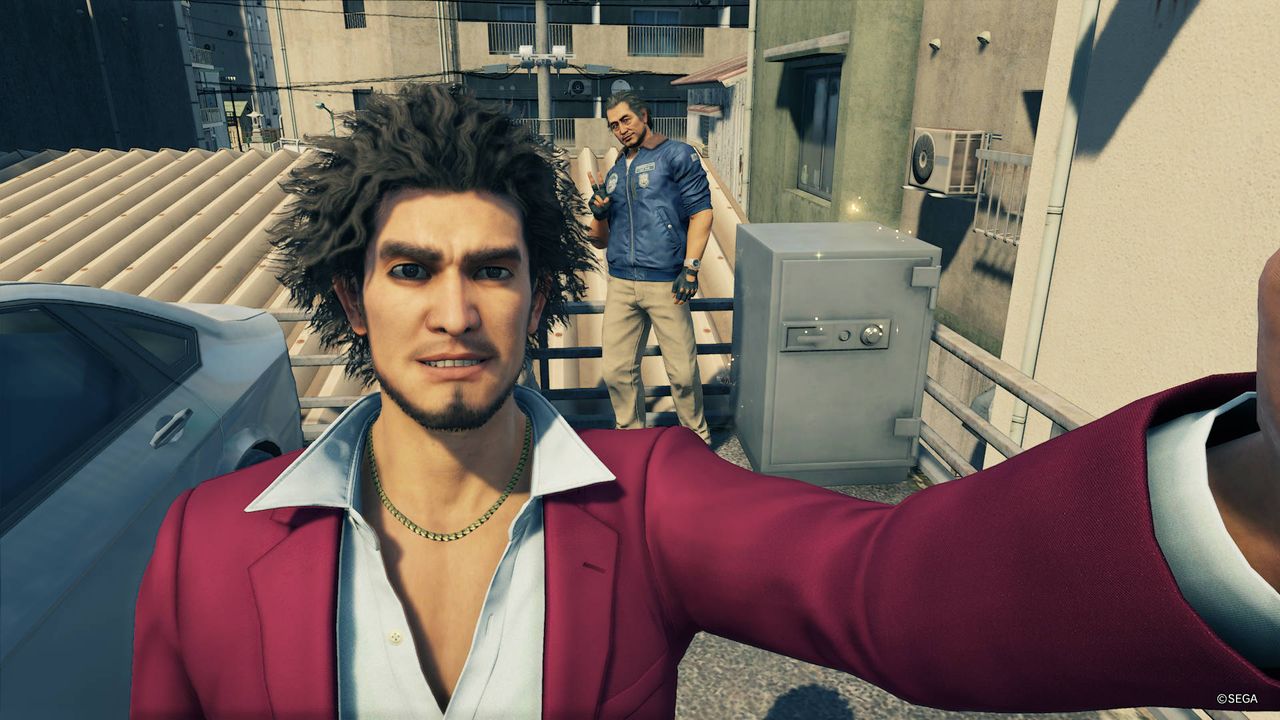 Yakuza: Like A Dragon - Ichiban takes a selfie with a silver safe