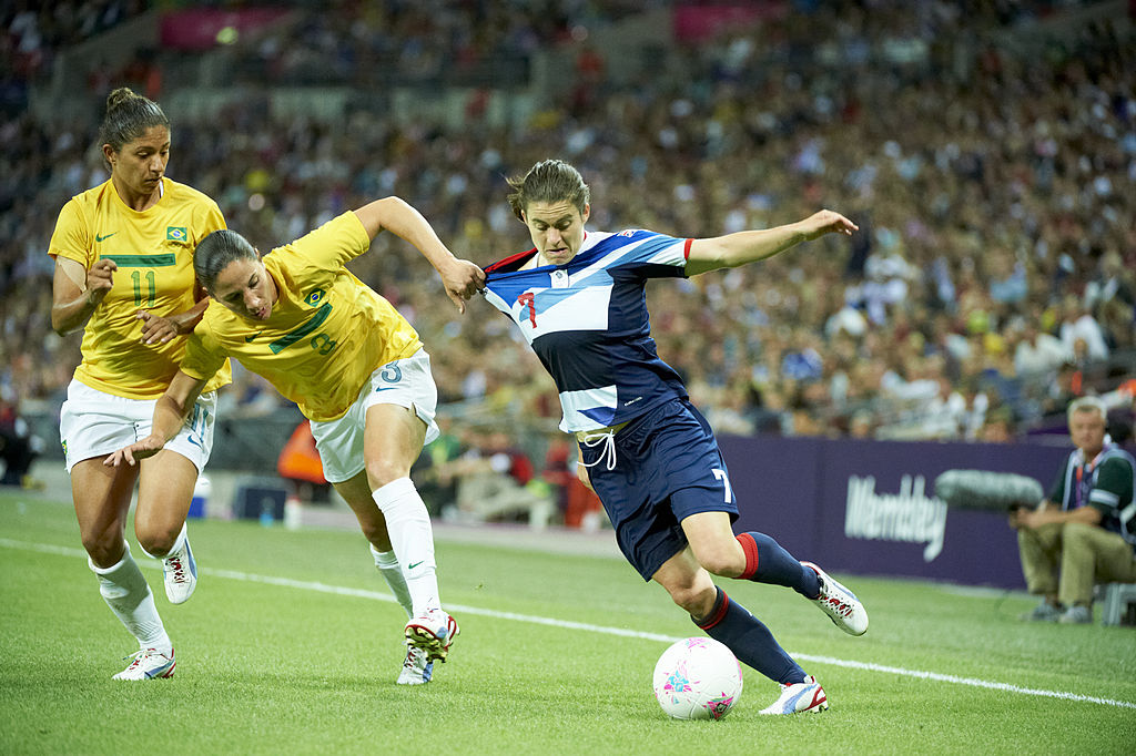 Karen Carney tussles with Daiane during Great Britain vs Brazil at the 2012 Olympics