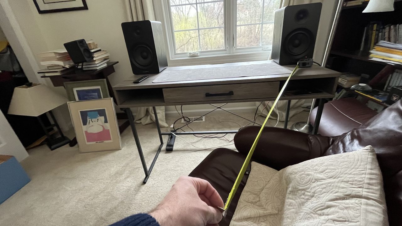 Tape measure showing reviewer to be three feet away from Fluance Ai61 speakers at the head of an equilateral triangle