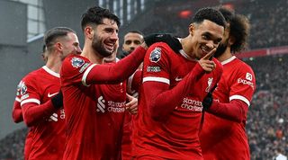 Trent Alexander-Arnold celebrates with his Liverpool team-mates after scoring a late winner against Fulham in December 2023.