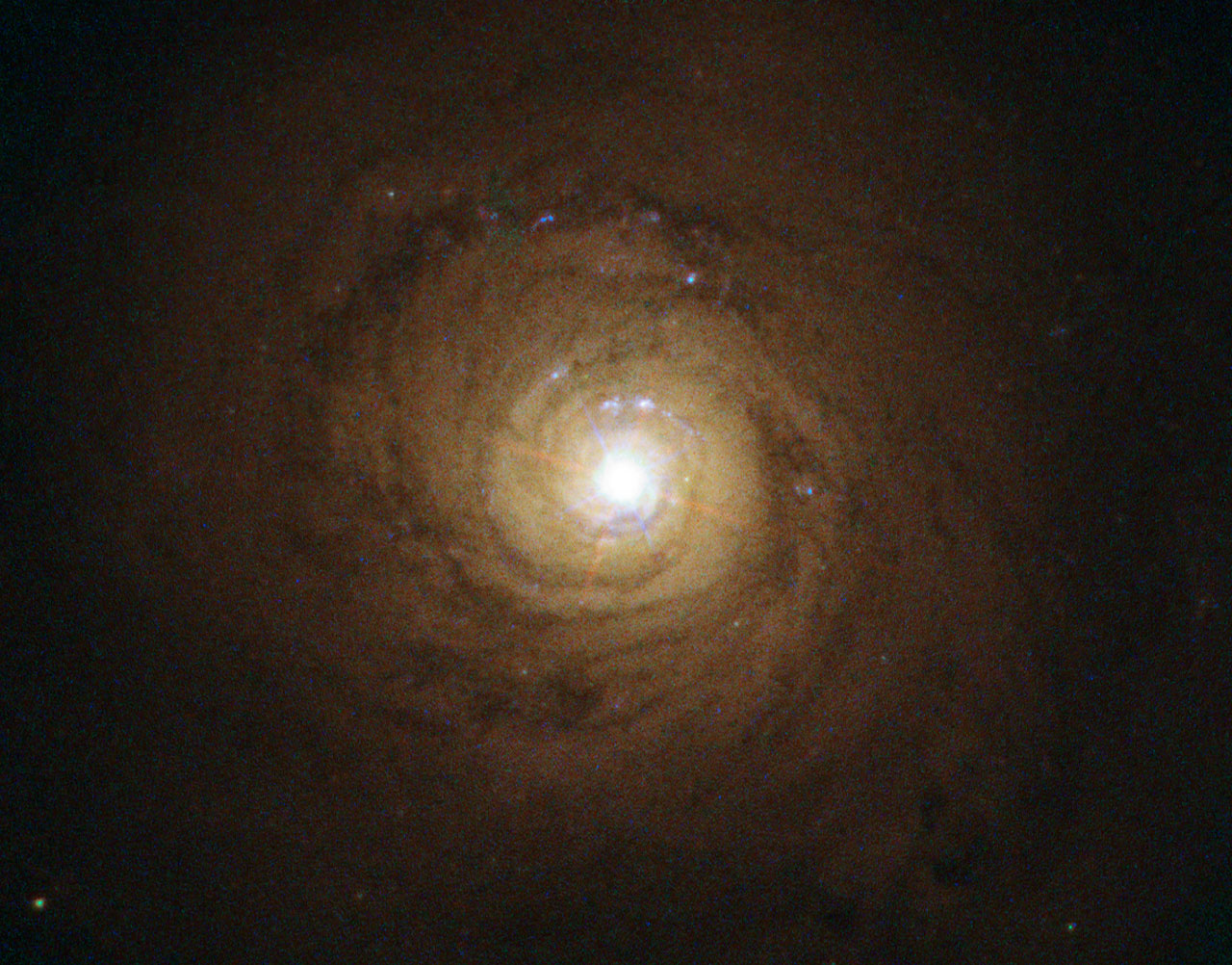 The supermassive black hole at the center of NGC 5548 behaves strangely. The galaxy is about 245 million light-years from Earth.