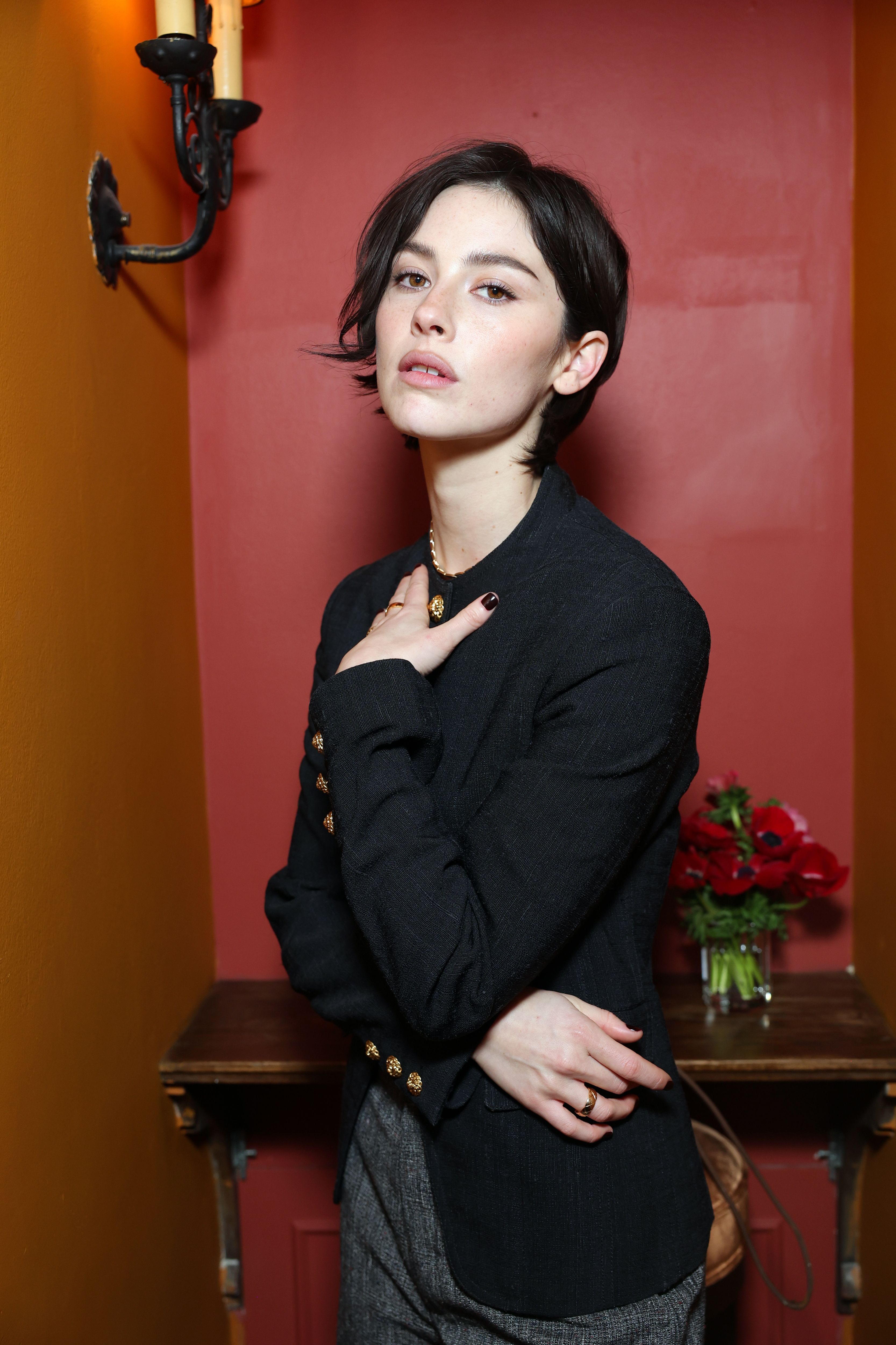 Gracie Abrams with a choppy brunette bixie cut