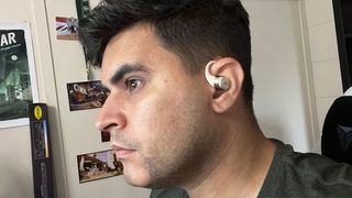 Shokz OpenFit on the ear of the author.