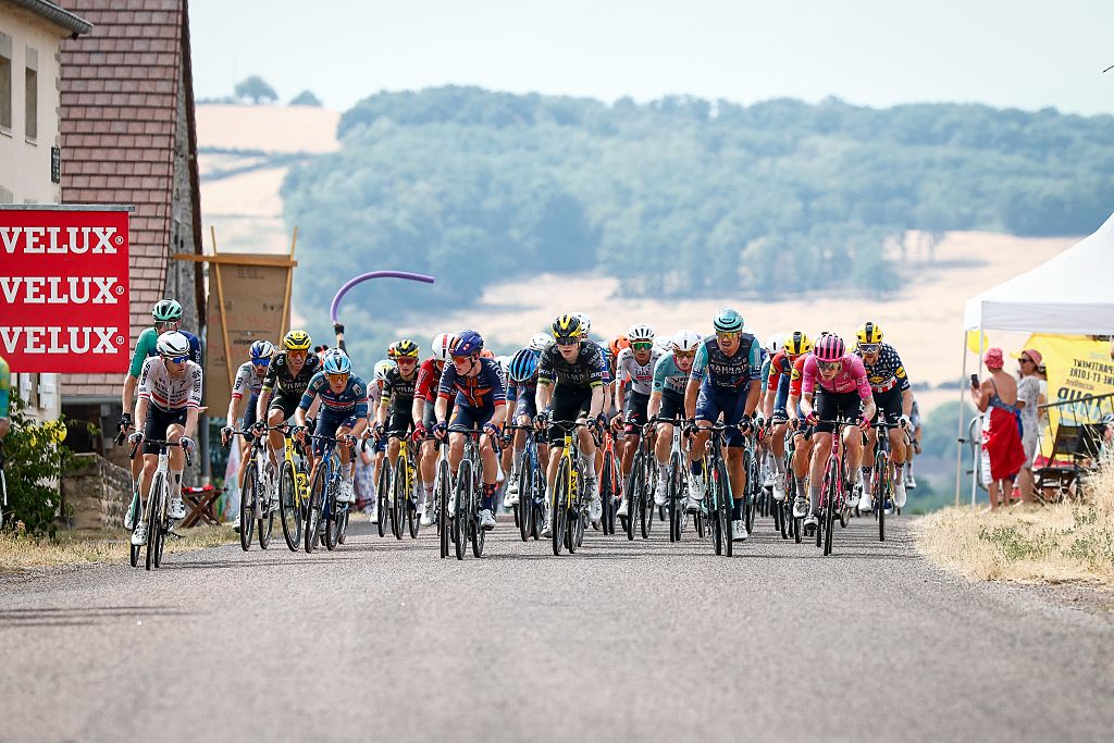 The pack of riders pictured in action during the stage 12 of the 2026 Tour de France cycling race, a stage of 181km from Nevers Magny-Cours to Chalon-sur-Saone, on Thursday 16 July 2026. The 113th edition of the Tour de France starts on Saturday 4 July in Barcelona, Spain, and will finish in Paris, France on the 26th of July. BELGA PHOTO POOL LUCA BETTINI (Photo by POOL LUCA BETTINI / BELGA MAG / Belga via AFP)