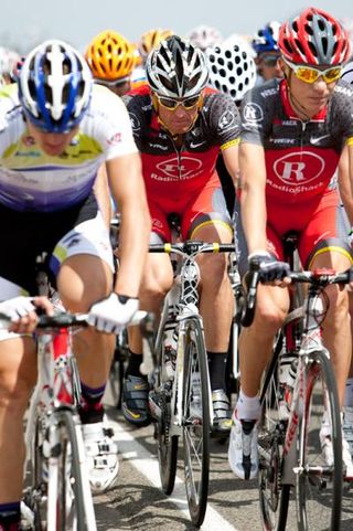 Lance Armstrong rides behind RadioShack teammate Janez Brajkovic.
