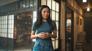 Cate standing and holding a mug in Monarch: Legacy of Monsters season 2 episode 7