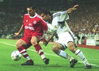 Real Madrid's Luis Figo up against Bayern Munich's Willy Sagnol in the Champions League in 2001.