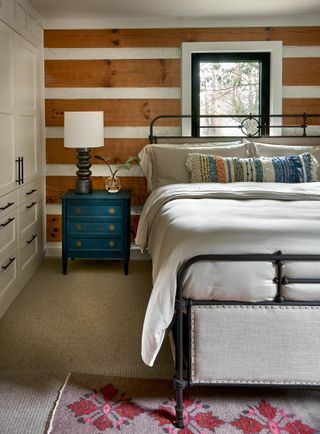 bed in a log cabin