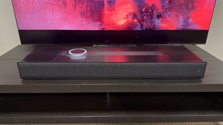 The Focal Mu-so Hekla in front of the Samsung R95H TV showing a scene from Elio.