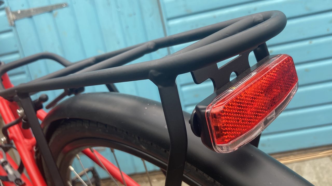 A photo of the rear rack and light on a Trek FX 2 Disc Equipped