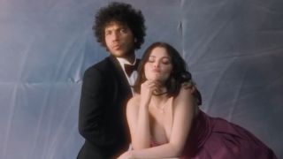 Benny Blanco and Selena Gomez taking prom photos for the Talk music video.