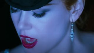 Nicole Kidman sings "Diamonds Are A Girl's Best Friend" in Moulin Rouge.