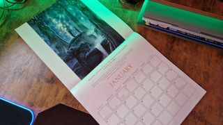 Official Tolkien Calendar 2023 image of the January spread which shows a painting of Thingol an Melian
