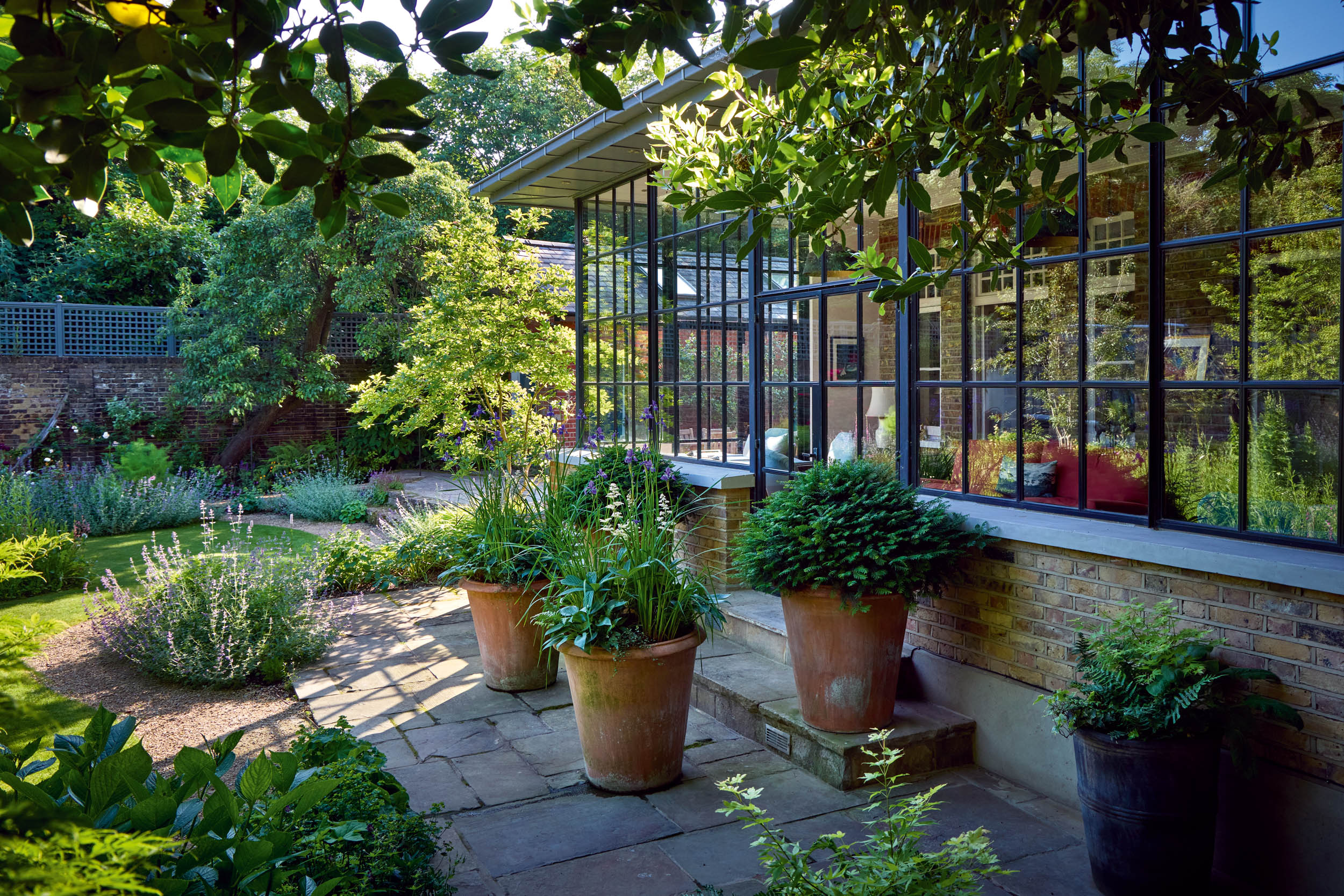 The London-based designer Butter Wakefield is sought after for her rare ability to lend a bucolic feel to gardens in urban settings &amp;mdash; Country Life Top 100 2026