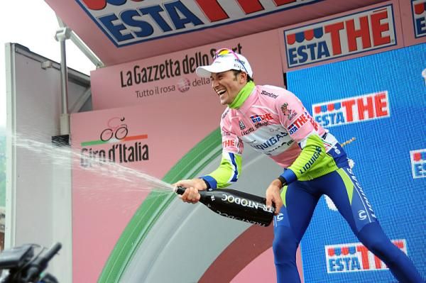 Race leader Ivan Basso (Liquigas - Doimo) lets loose with the champagne.