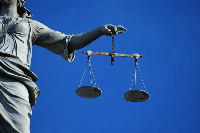 Lady Justice holding the scales of justice.