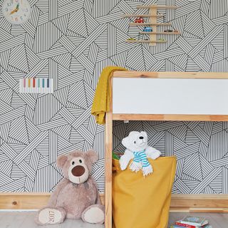 Childrens room with toys on display and stored on shelves and boxes