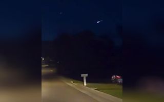 A brilliant fireball lights up the night sky over Knoxville, Tennessee in this cell phone video captured from moving vehicle by witness Austin R. at 9:42 p.m. EDT (0142 GMT) on June 7, 2020.