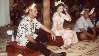 The Queen And Prince Philip Attending A Traditional Feast During Their Tour Of The South Pacific.