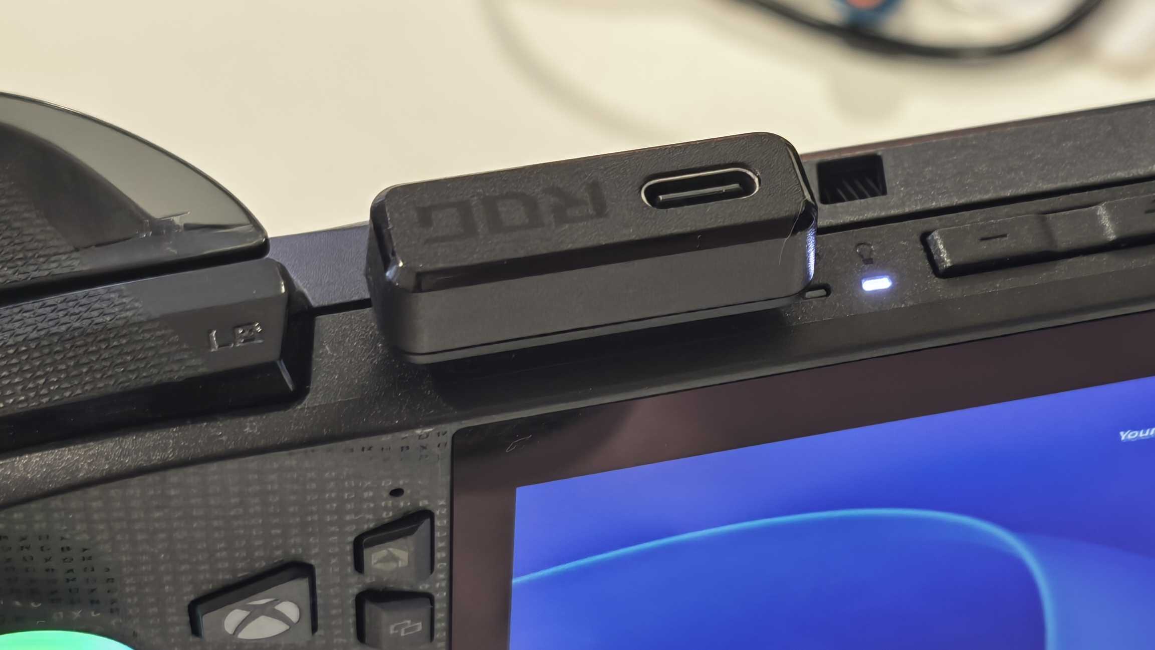 The Asus ROG Cetra Open wireless gaming earbuds.