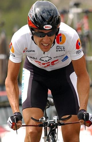 Carlos Sastre (CSC) wears the white jersey