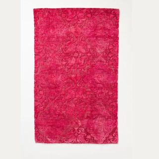 hot pink handknotted rug from anthropologie
