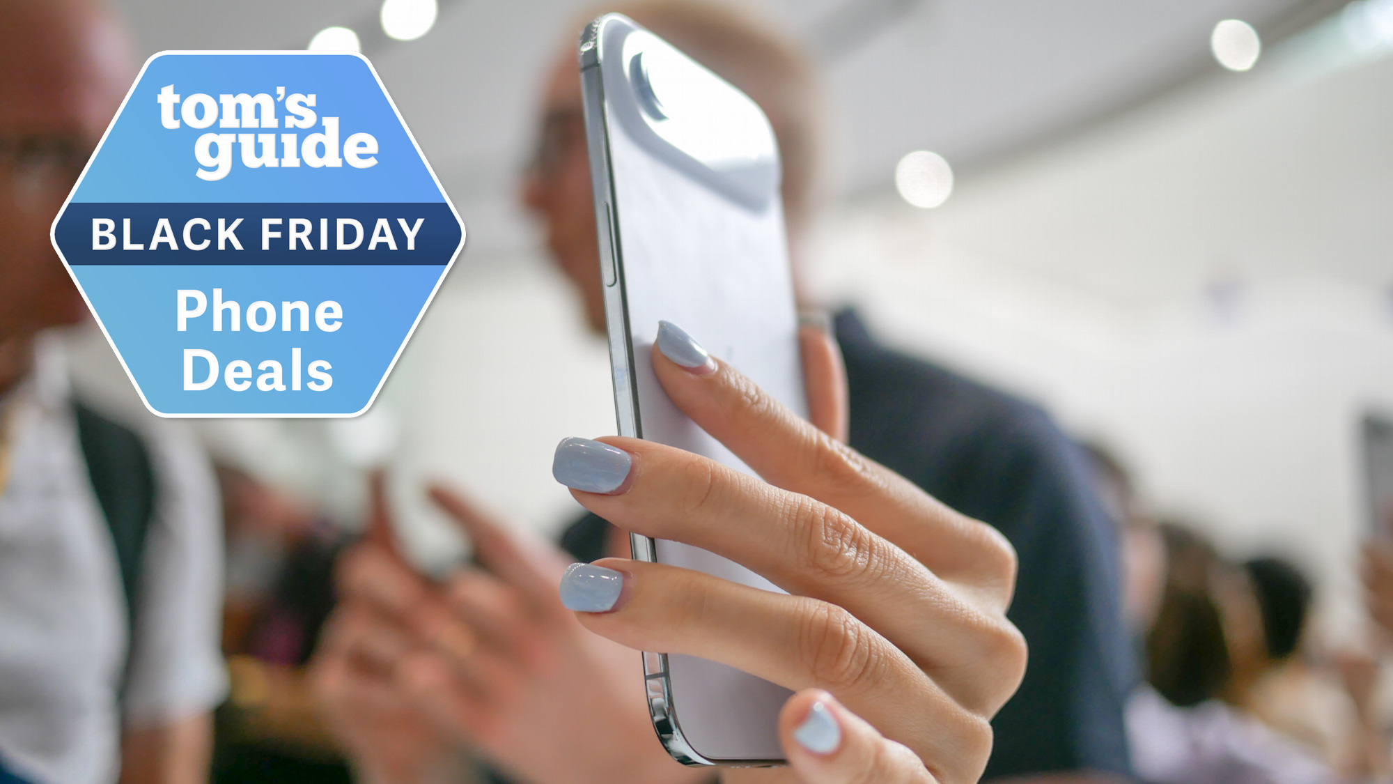 iPhone Air held in the hand with Black Friday badge nearby.