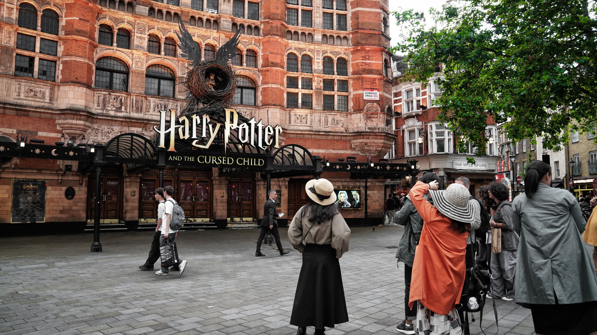 the front of a theater where Harry Potter and the Cursed Child is playing