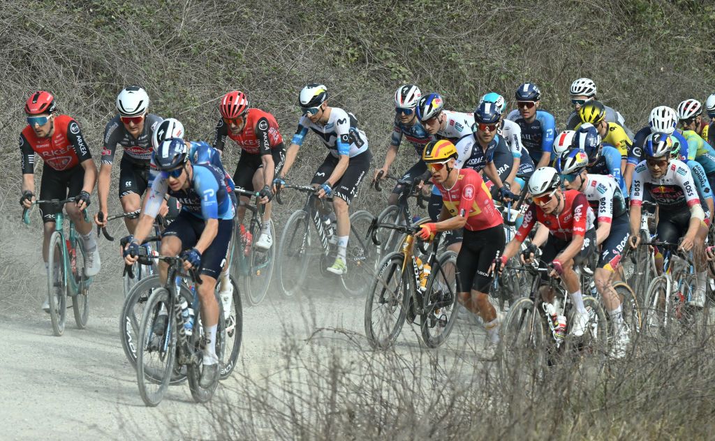 SIENA ITALY MARCH 08 LR Anthony Delaplace of France and Team ArkeaBB Hotels Davide Formolo of Italy and Team Movistar Team and a general view of the peloton competing during the 19th Strade Bianche 2025 Mens Elite a 213km one day race from Siena to Siena 320m UCIWT on March 08 2025 in Siena Italy Photo by Tim de WaeleGetty Images
