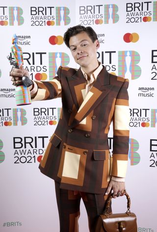 Harry Styles wins the Mastercard British Single award for Watermelon Sugar during The BRIT Awards 2021 at The O2 Arena on May 11, 2021 in London, England
