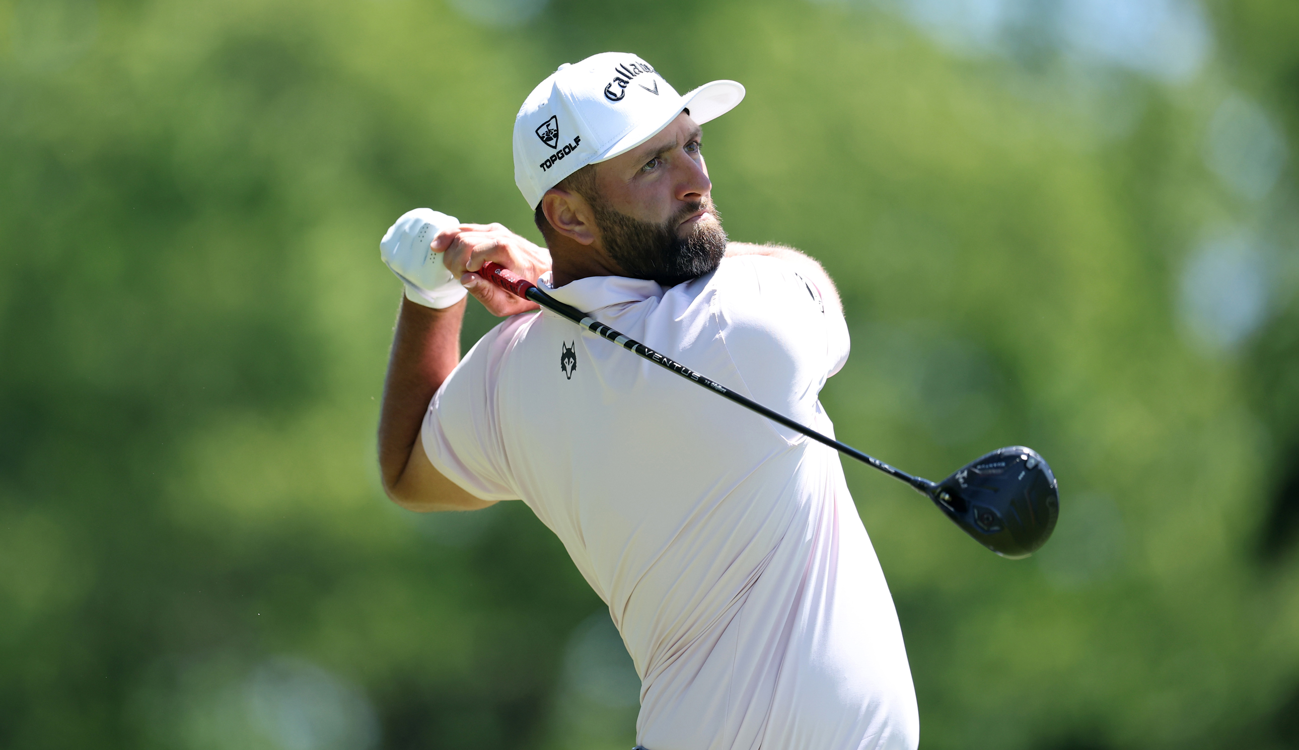 Jon Rahm hits a driver off the tee